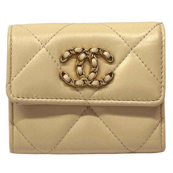 CHANEL Handbags - CHANEL Authentic Cream Lambskin Leather Logo Wallet